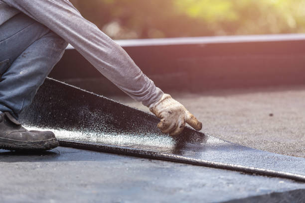 Professional Basement Waterproofing technician working in Anna, OH